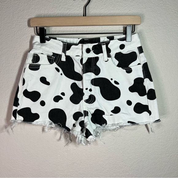Forever 21 Pants - Forever 21 cow print denim cutoff Jean shorts size small